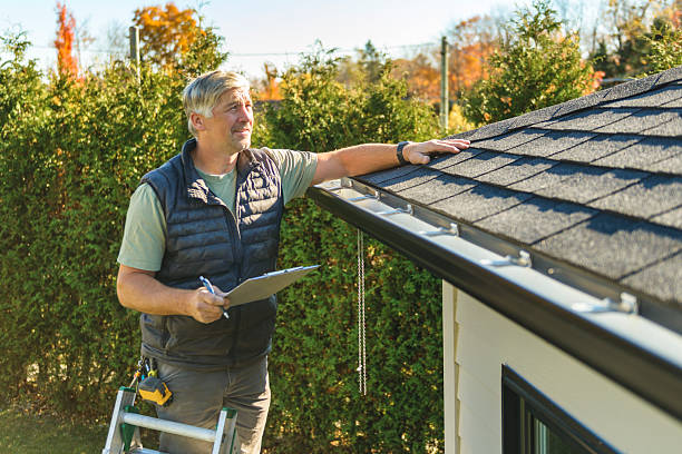 Professional Roofing technician working in Weare, NH